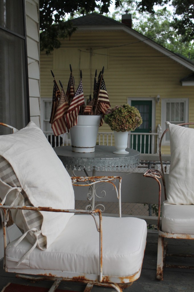 Rusty and the refined.  Linen pillows, custom cushion make these some very comfortable vintage rocking chairs.
