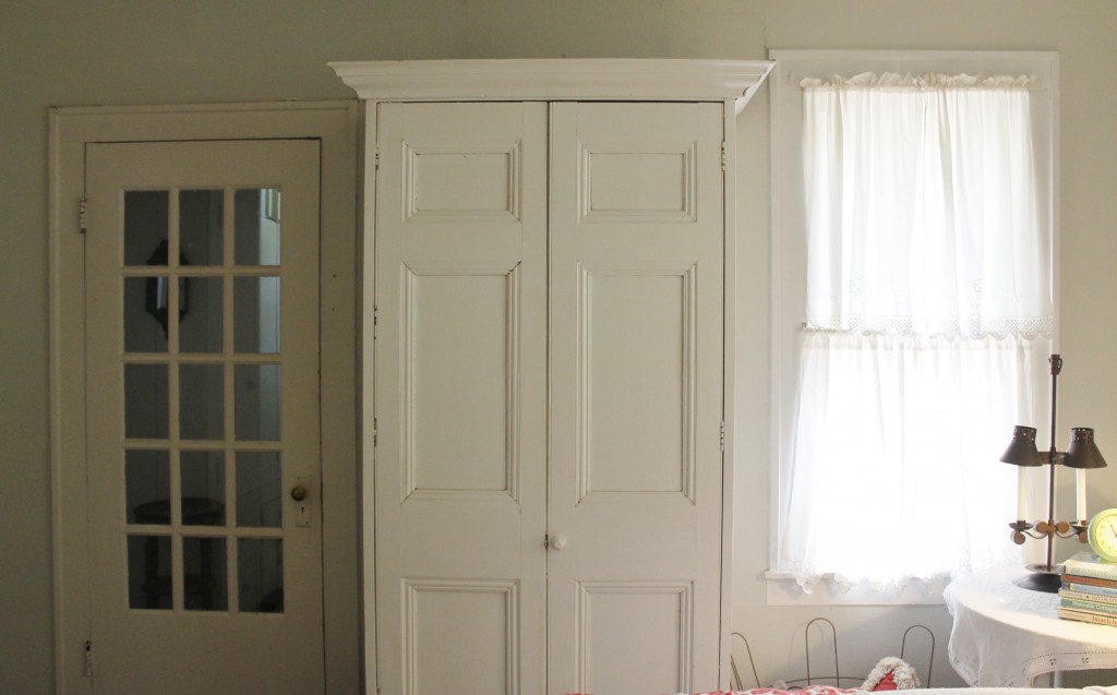 This lovely white, weathered armoire doubles as my closet.