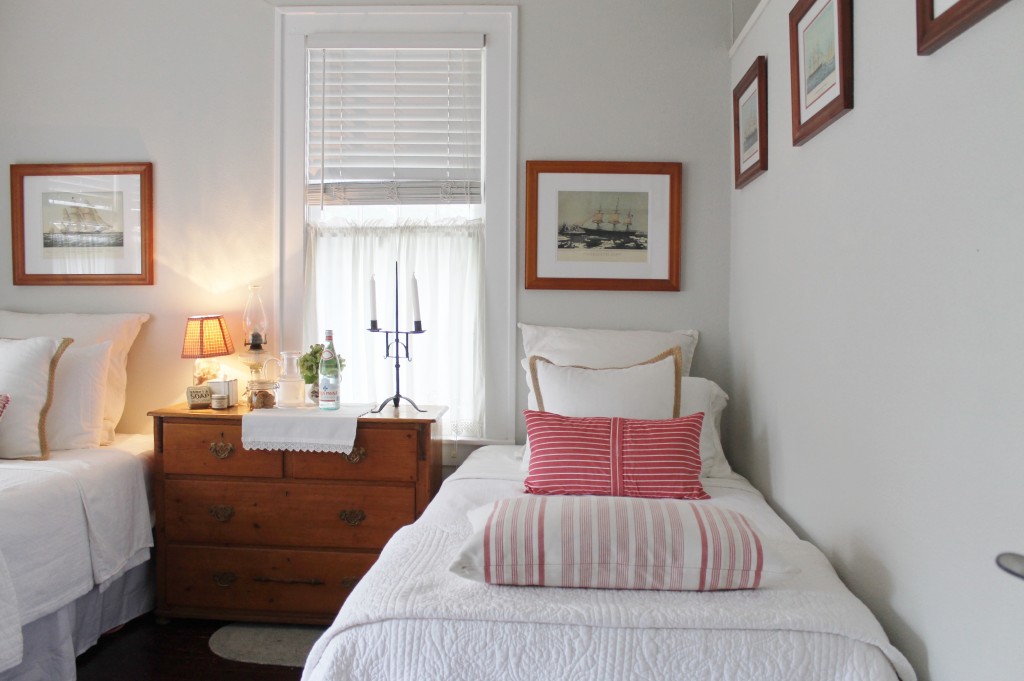 A mostly soothing, white room, I can't resist well placed doses of my favorite color, red.